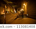 A mysterious illuminated space in the ruins of an underground mine 113081408