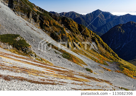 Autumn leaves at Karasawa Curl in the Northern Alps and view of Mt. Jonen 113082306