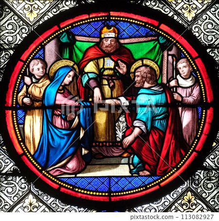 Marriage of St Joseph and Virgin Mary, stained glass window in the Basilica of Saint Clotilde in Paris, France 113082927