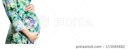 Belly of a pregnant woman on a white background. Belly of a pregnant woman on a white background. 113084882