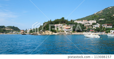 Monastery on the water, over which planes take off and land Greece Corfu island Vlacherna Monastery  113086157