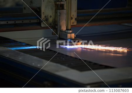 Plasma cutting of metal.Cutting of metal. Sparks fly from laser 113087603