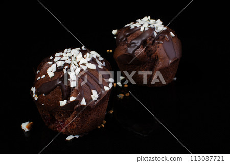Chocolate muffin on a dark background 113087721