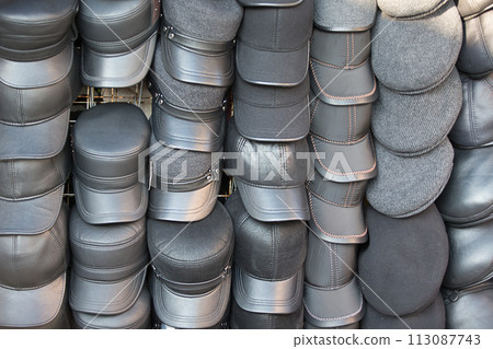 Men's hats on the market. Leather caps 113087743