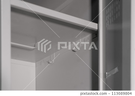 White lockers for locker room. Change room metal box 113089804