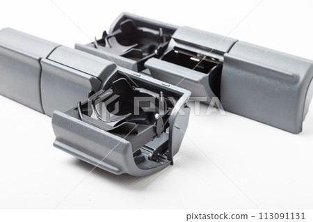 two cup holders for tea or coffee of car on white isolated background. Spare parts catalor for vehicled. two cup holders for tea or coffee of car on white isolated background. Spare parts catalor for vehicled. 113091131