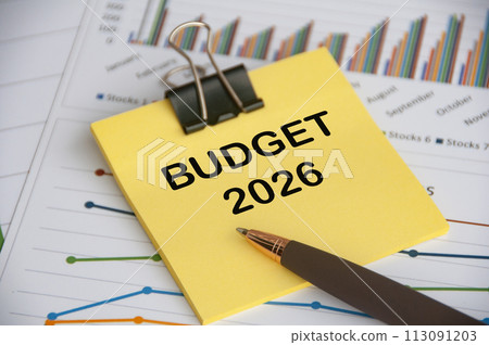 Budget 2026 on yellow notepad with business analysis background 113091203