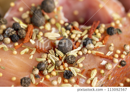 raw fish with red meat during cooking raw fish with red meat during cooking 113092567