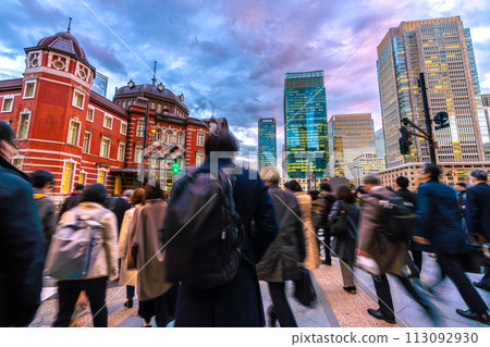 Tokyo cityscape in Japan Tokyo Station Marunouchi North Exit. People heading to the station after finishing work. In the back are office buildings in Marunouchi Tokyo cityscape in Japan Tokyo Station Marunouchi North Exit. People heading to the station after finishing work. In the back are office buildings in Marunouchi 113092930