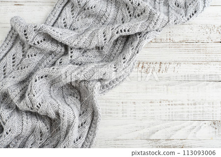 Knit texture of light gray wool knitted fabric Knit texture of light gray wool knitted fabric 113093006