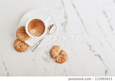 Cup of espresso coffee with amaretti cookie 113093013