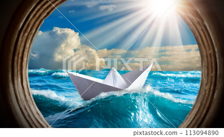 Paper Boat in the Blue Waves of the Sea Seen Through the Porthole - Generative Ai 113094890