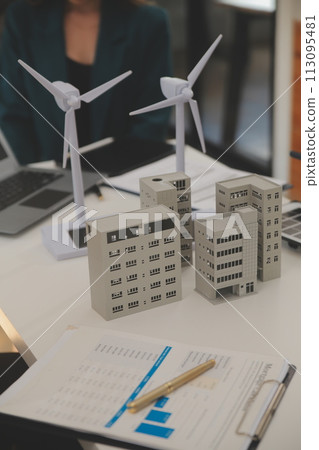 Electrical engineer with businessman discussing new project installation solar cell panel on the roof of building. Alternative energy concept. Electrical engineer with businessman discussing new project installation solar cell panel on the roof of building. Alternative energy concept. 113095481