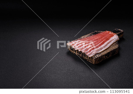 Fresh raw bacon sliced with spices and herbs Fresh raw bacon sliced with spices and herbs 113095541