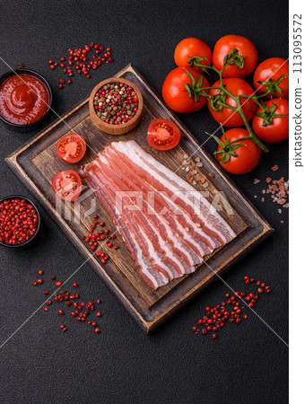 Fresh raw bacon sliced with spices and herbs 113095572