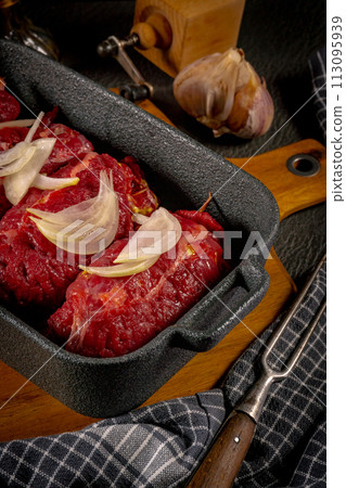Raw Silesian beef roulades prepared for stewing. 113095939