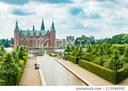 View of Frederiksborg castle with park in Hillerod, Denmark 113096092