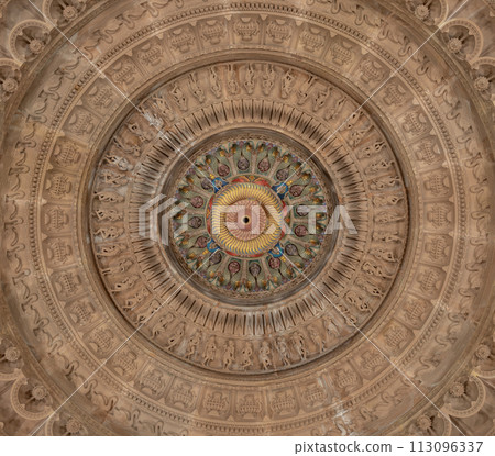 Elaborate ceiling design of intricately carved stone interior of The Shree Sanatan Hindu Mandir Hindu Temple. Elaborate ceiling design of intricately carved stone interior of The Shree Sanatan Hindu Mandir Hindu Temple. 113096337