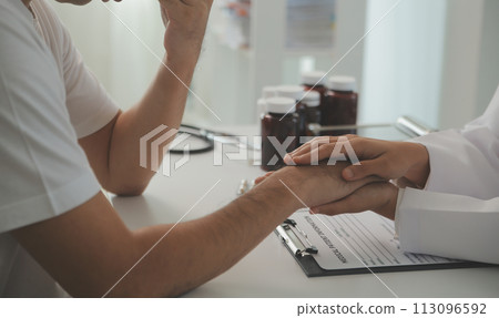 Homecare nursing service and elderly people cardiology healthcare. Close up of young hispanic female doctor nurse check mature caucasian man patient heartbeat using stethoscope during visit 113096592
