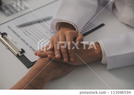 Homecare nursing service and elderly people cardiology healthcare. Close up of young hispanic female doctor nurse check mature caucasian man patient heartbeat using stethoscope during visit 113096594