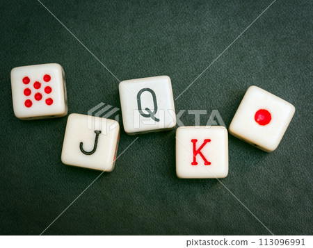 A Straight on poker dices on a black background. Close-up 113096991