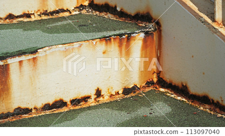 Deteriorated pedestrian bridge stairs (paint rusting, waterproofing peeling off) 113097040