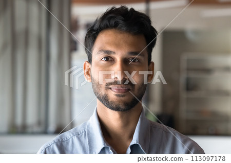 Positive handsome young Indian man head shot front portrait Positive handsome young Indian man head shot front portrait 113097178