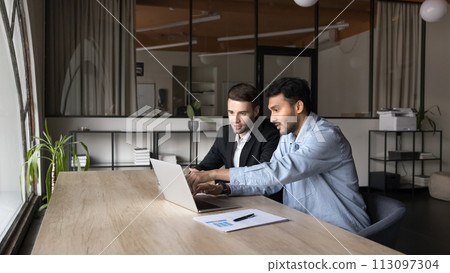 Two young diverse project managers men working on startup 113097304