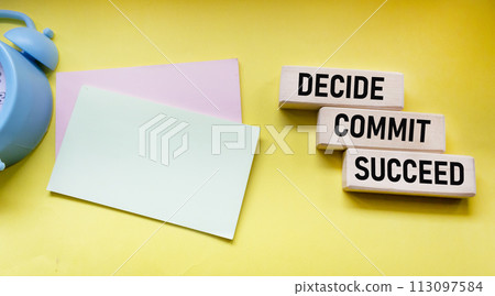 Decide Commit Succeed concept word on wooden blocks. Stickers for writing.  113097584