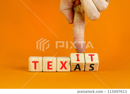 Texas or Texit symbol. Concept word Texas or Texit on beautiful wooden cubes. Beautiful orange table orange background. Businessman hand. Business Texas or Texit concept. Copy space. Texas or Texit symbol. Concept word Texas or Texit on beautiful wooden cubes. Beautiful orange table orange background. Businessman hand. Business Texas or Texit concept. Copy space. 113097613