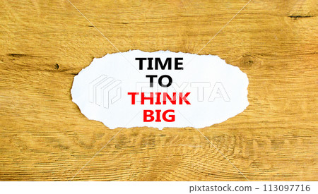 Time to think big symbol. Concept words Time to think big on beautiful white paper. Beautiful wooden background. Business and time to think big concept. Copy space. Time to think big symbol. Concept words Time to think big on beautiful white paper. Beautiful wooden background. Business and time to think big concept. Copy space. 113097716