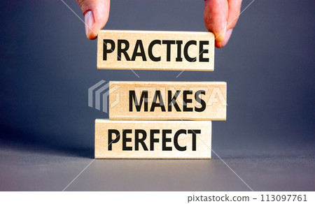 Practice makes perfect symbol. Concept words Practice makes perfect on wooden block. Beautiful grey table grey background. Businessman hand. Business practice makes perfect concept. Copy space. Practice makes perfect symbol. Concept words Practice makes perfect on wooden block. Beautiful grey table grey background. Businessman hand. Business practice makes perfect concept. Copy space. 113097761
