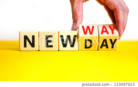 New day and way symbol. Concept word New day New way on beautiful wooden cubes. Beautiful yellow table white background. Businessman hand. Business new day and way concept. Copy space. 113097823