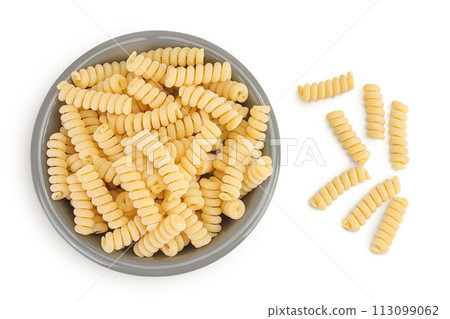 Italian spiral shaped pasta, Fusilli bucati macaroni in ceramic bowl, isolated on white background. Top view. Flat lay. 113099062