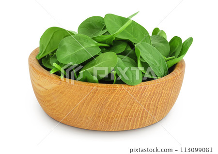 Baby spinach leaves in wooden bowl isolated on white background Baby spinach leaves in wooden bowl isolated on white background 113099081