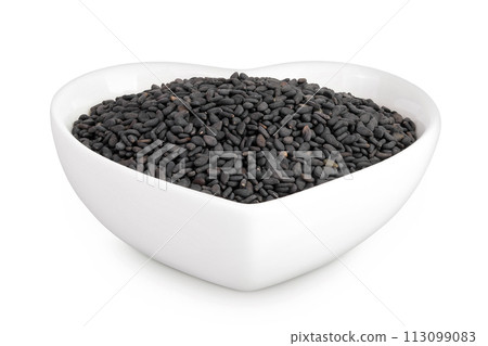 black sesame seeds in ceramic bowl isolated on white background with full depth of field 113099083