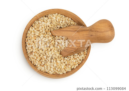 Sesame seeds in wooden bowl and scoop isolated on white background. Top view. Flat lay Sesame seeds in wooden bowl and scoop isolated on white background. Top view. Flat lay 113099084