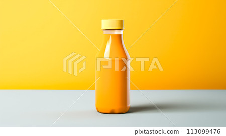Orange juice in a glass bottle, vibrant background. 113099476