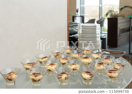 Vases with pudding at a banquet 113099730
