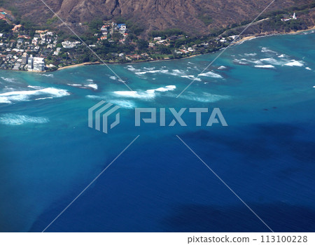 Aerial view of slopes of Diamond Head crater with road surrounded by Luxury homes 113100228