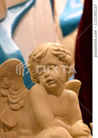 A cute angel statue with a loving expression A cute angel statue with a loving expression 113100237