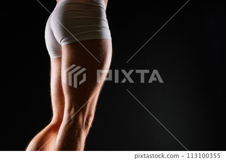 Male muscular legs body-building, muscle man in white sport panties Male muscular legs body-building, muscle man in white sport panties 113100355