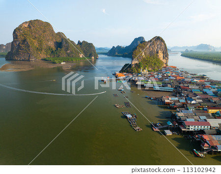 Aerial view of Panyee island in Phang Nga Thailand,High angle view Floating village, Koh Panyee fishing village island in Phang Nga, Thailand Aerial view of Panyee island in Phang Nga Thailand,High angle view Floating village, Koh Panyee fishing village island in Phang Nga, Thailand 113102942