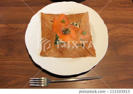 Bretonne with buckwheat flour galette, creamed spinach, smoked salmon and capers Bretonne with buckwheat flour galette, creamed spinach, smoked salmon and capers 113103913