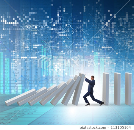 Businessman preventing domino effect in business concept 113105104