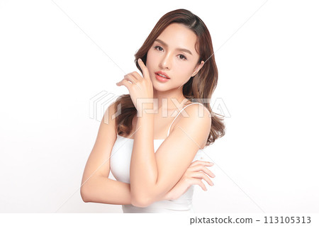Beautiful young asian woman with clean fresh skin on white background, Face care, Facial treatment, Cosmetology, beauty and spa, Asian women portrait. Beautiful young asian woman with clean fresh skin on white background, Face care, Facial treatment, Cosmetology, beauty and spa, Asian women portrait. 113105313