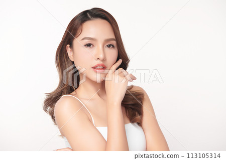 Beautiful young asian woman with clean fresh skin on white background, Face care, Facial treatment, Cosmetology, beauty and spa, Asian women portrait. Beautiful young asian woman with clean fresh skin on white background, Face care, Facial treatment, Cosmetology, beauty and spa, Asian women portrait. 113105314