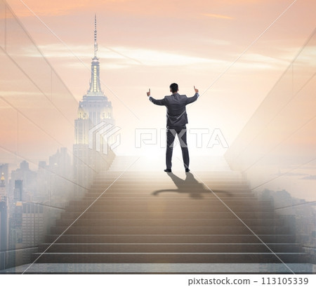 Businessman climbing up challenging career ladder in business co 113105339