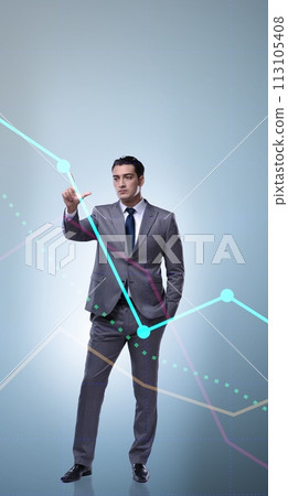 Businessman standing next to chart in business concept Businessman standing next to chart in business concept 113105408