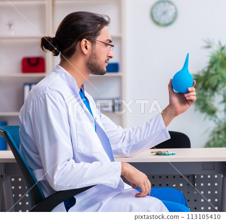 Young male doctor gastroenterologist working in the clinic Young male doctor gastroenterologist working in the clinic 113105410